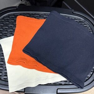 Free People Ribbed Tube Tops in Black, Orange, and Cream